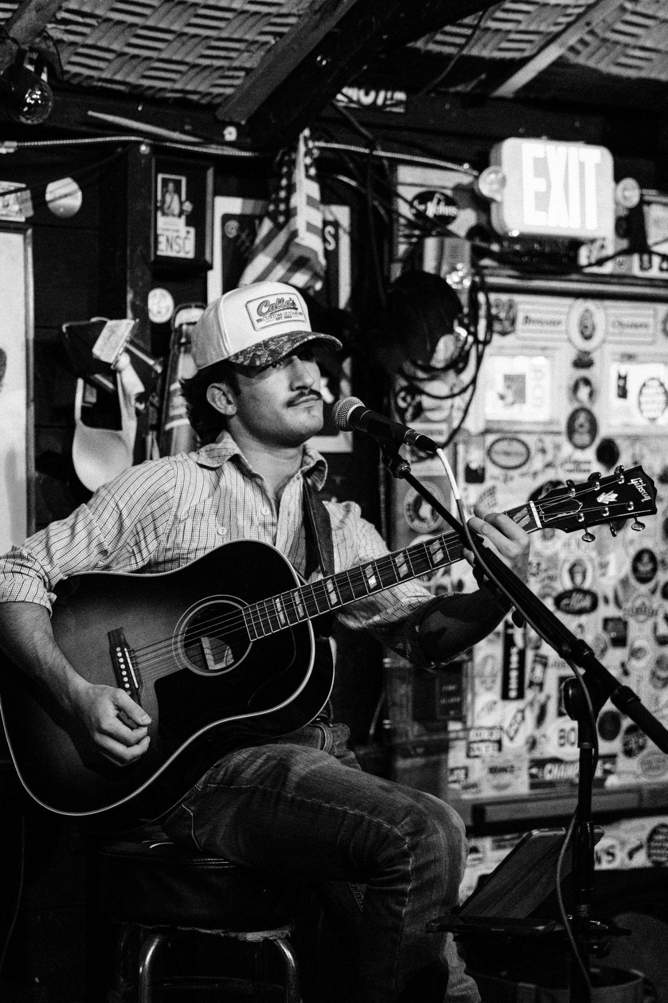 Anthony Calla - Seated Acoustic Portrait in Black and White