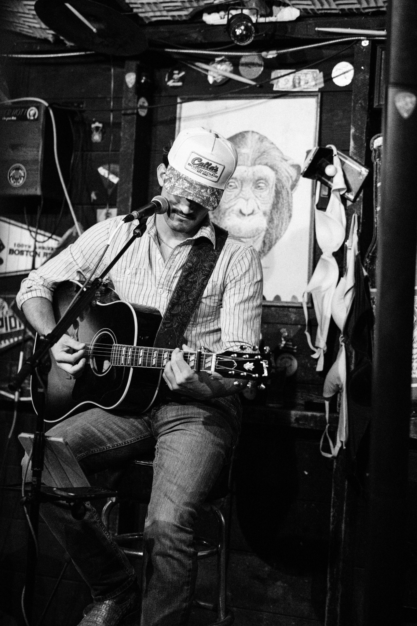 Anthony Calla - Intimate Stage Performance in Black and White
